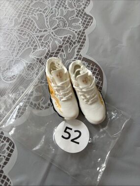 52, White and Gold Mini Sneakers - Nike SB Logo.